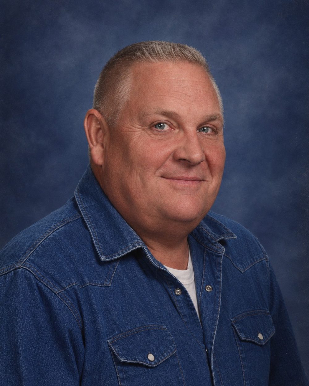 H. James "Jim" Hill, second-generation owner and auctioneer